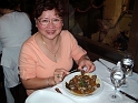 My wife Nancy eating snails